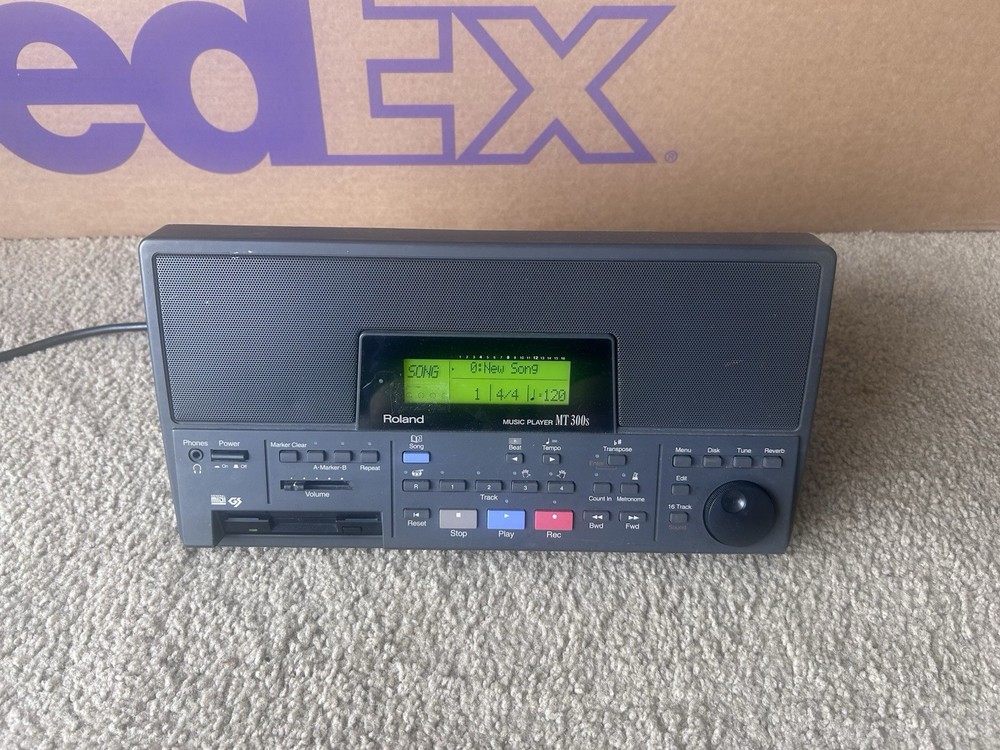 Roland Music Player MT-300s. Powers Up