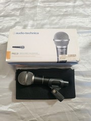 Vocal Microphones SHURE PGA 48 and Audio-Technica Pro 31 with Table Stand