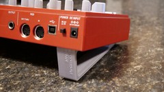Stands for Behringer TD-3 / RD-6. Custom design! Adhesive pad for solid grip!