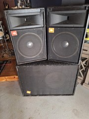 old school JBL 2 18 4 15 with horns two wedge monitors 5 crown amps.