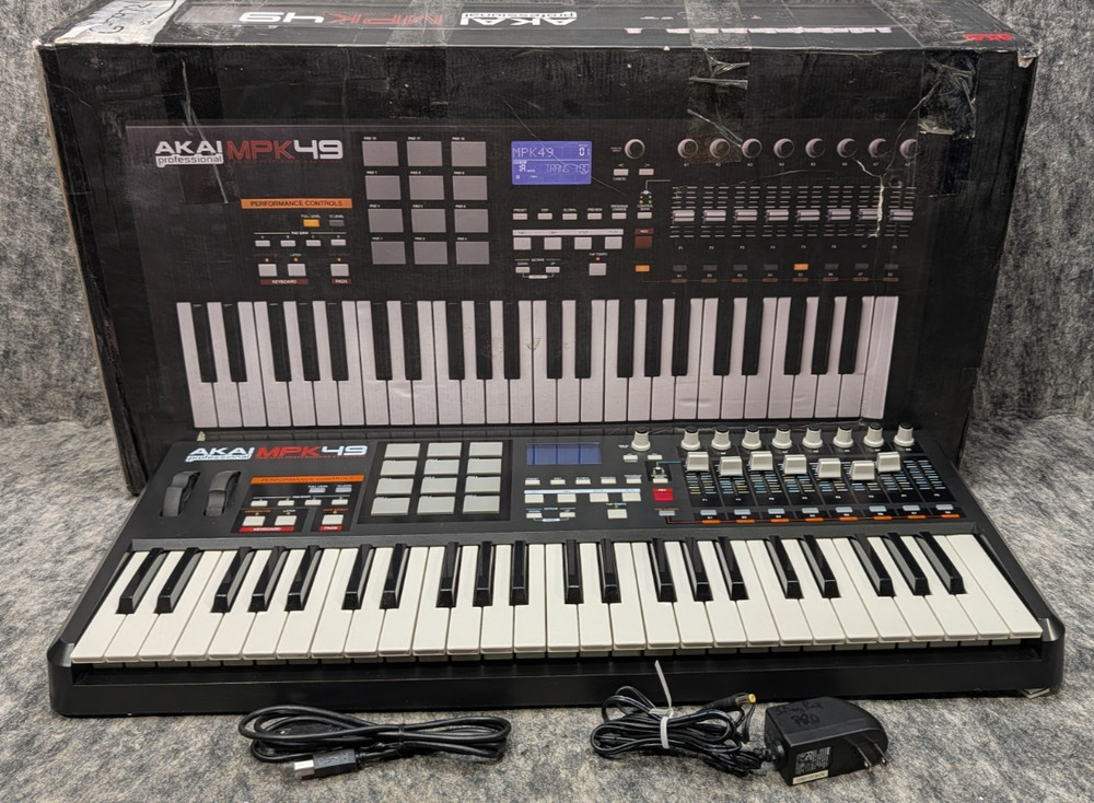 Akai Professional MPK49 – USB/MIDI Keyboard Controller – Popped Out F8 Lever