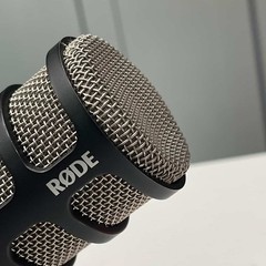 Rode PODMIC Dynamic Microphone With A Red Spit Pop Filter