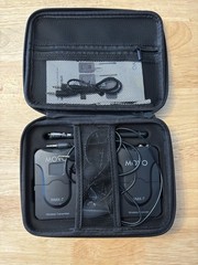Movo WMX-7 VHF 12-Channel Wireless Lavalier Microphone System with 1…