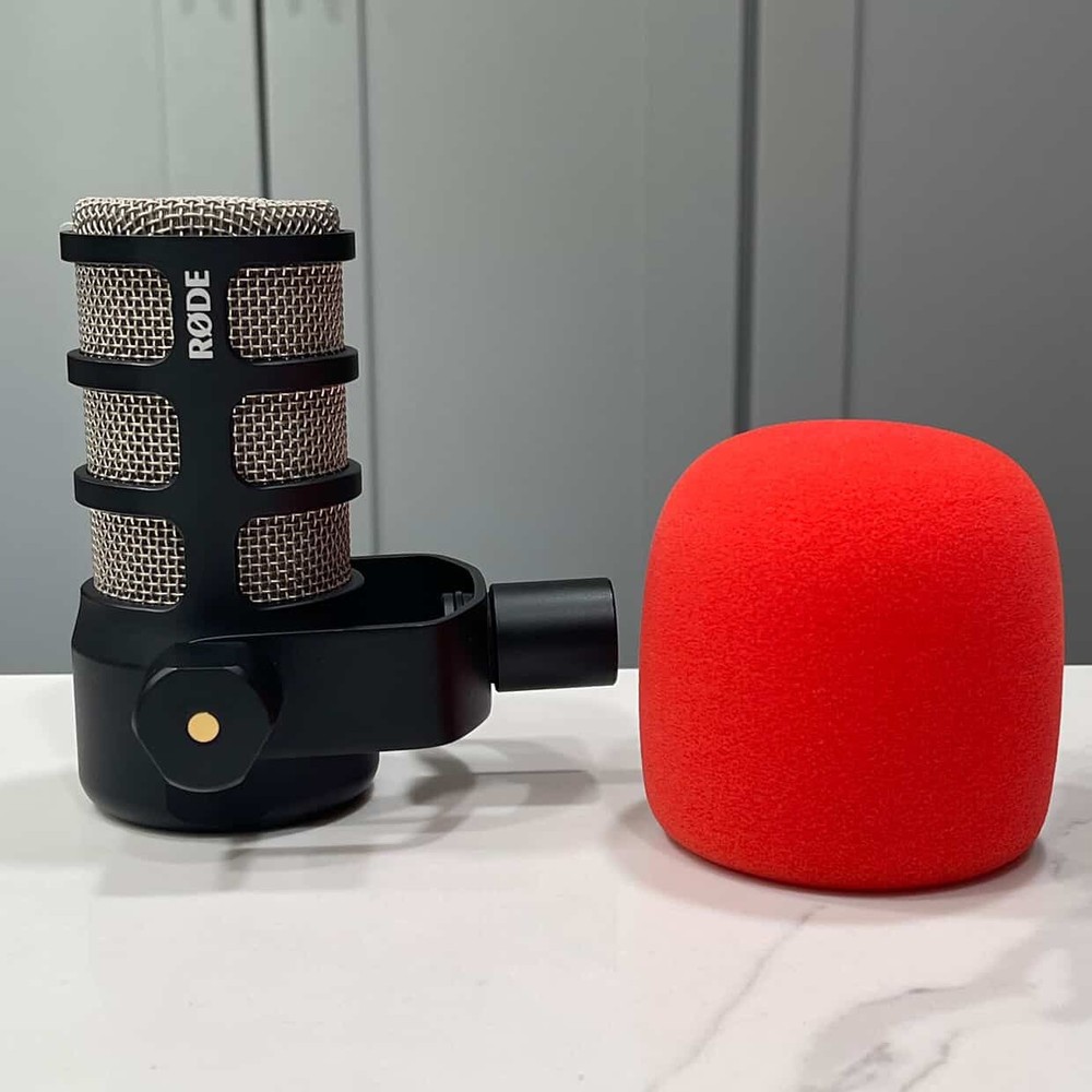 Rode PODMIC Dynamic Microphone With A Red Spit Pop Filter
