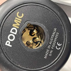 Rode PODMIC Dynamic Microphone With A Red Spit Pop Filter