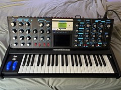 MiniMoog Voyager Electric Blue W/ATA Case, Manual, DVD, Dust Cover, Soft Bag.