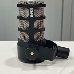 Rode PODMIC Dynamic Microphone With A Red Spit Pop Filter