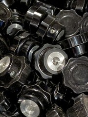 builder’s lot 50 NOS 1-1/8″ fluted black plastic knobs octal 8-point